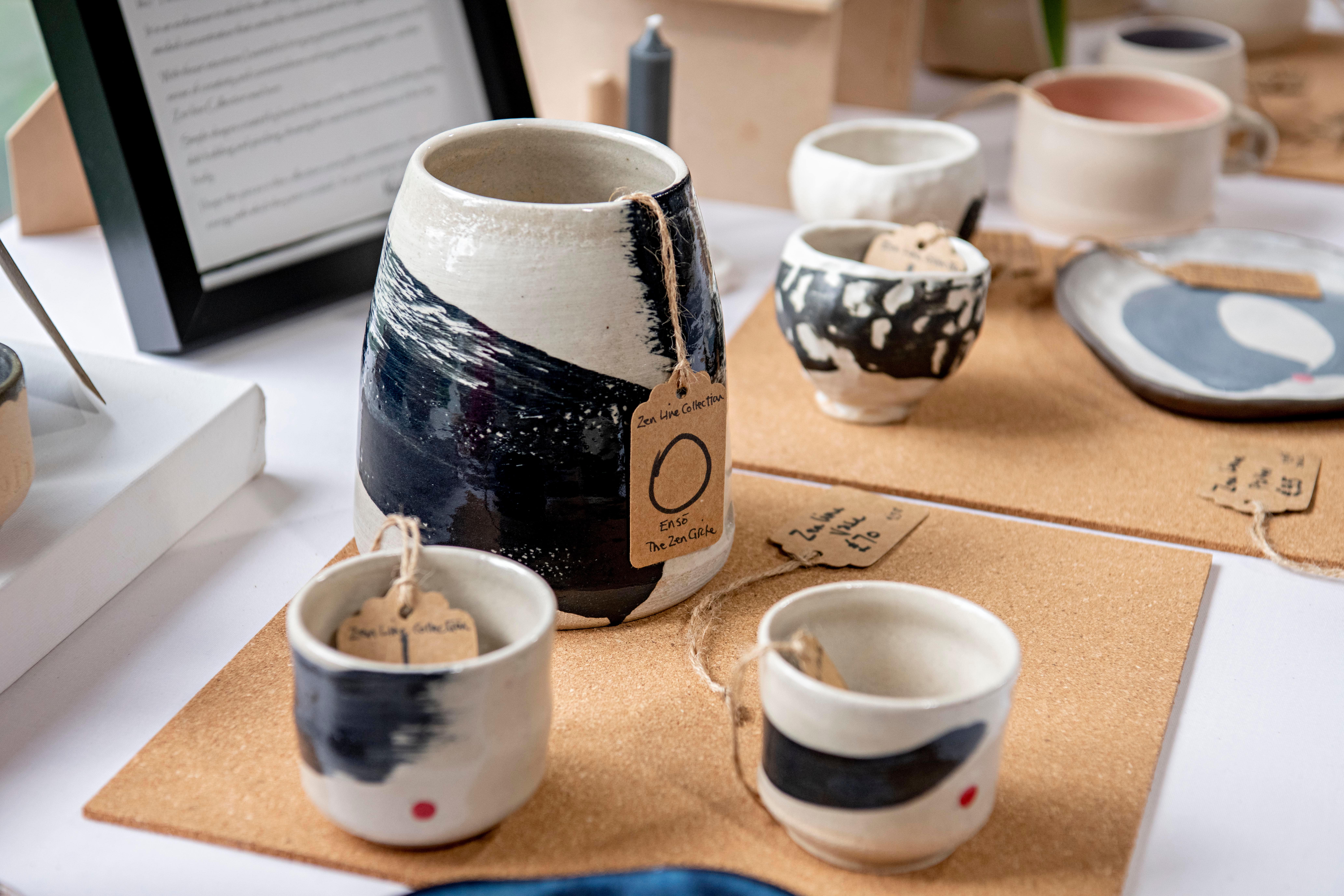 A collection of painted cups
